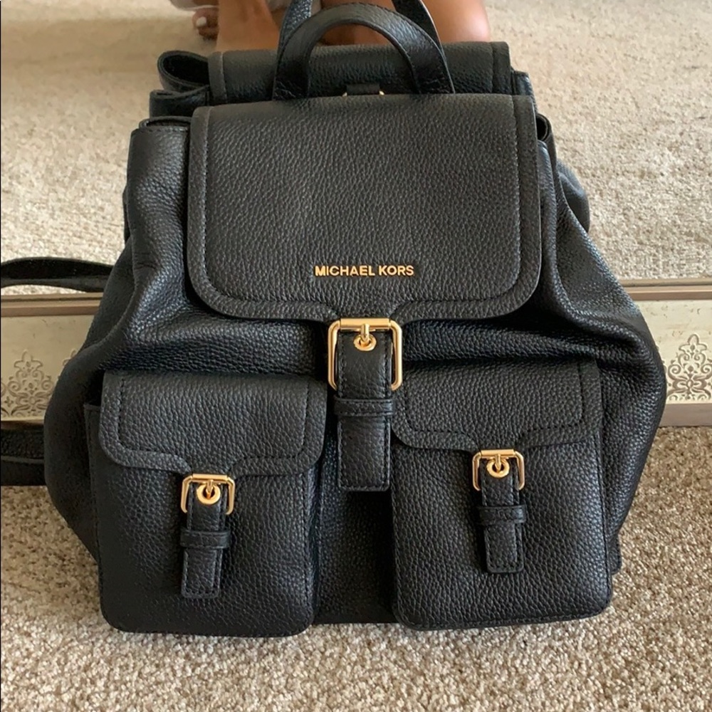 Black leather Michael Kors book bag